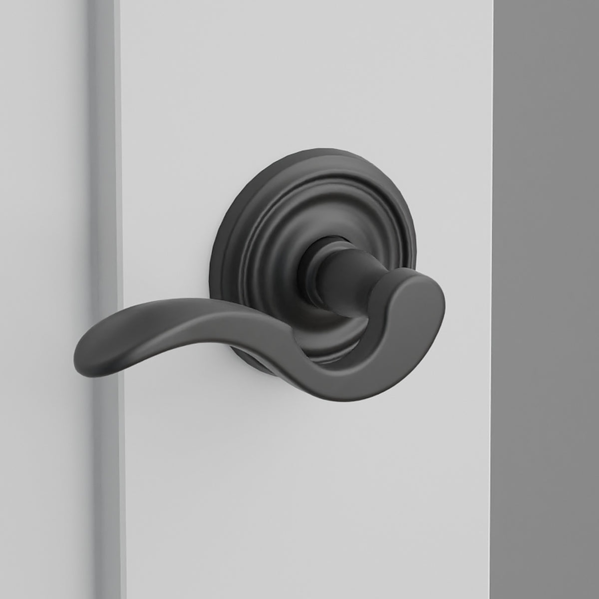 Cortina Lever Interior Lockset with Regular Rosette by Emtek, Flat Black, left handed