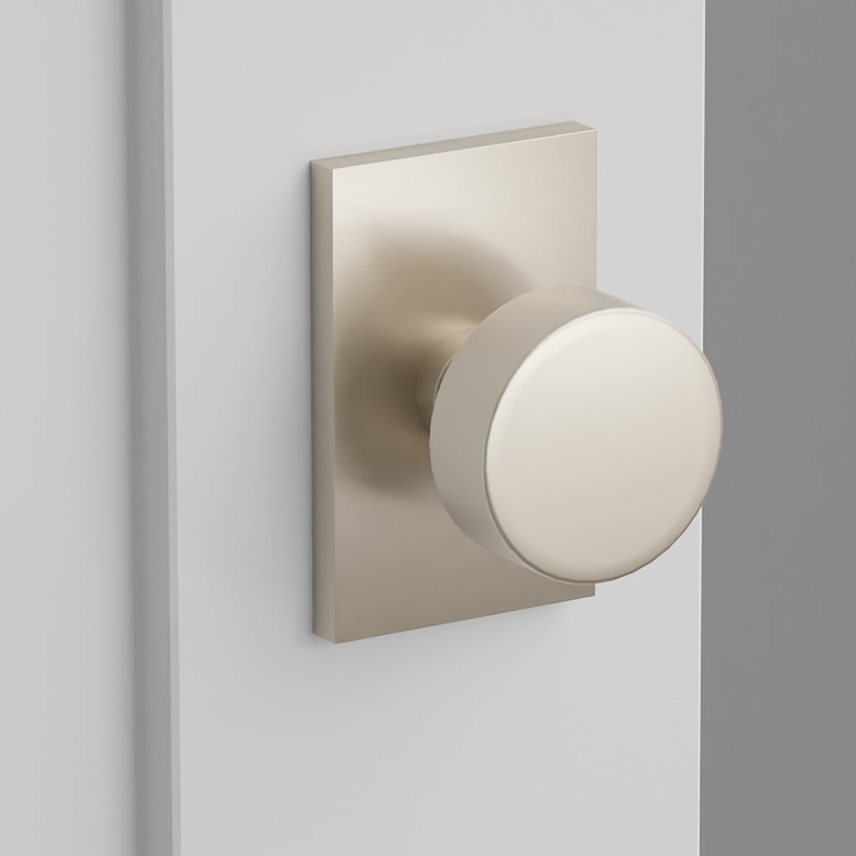 Round Knob Interior Lockset with Modern Rectangular Rosette by Emtek, Satin Nickel