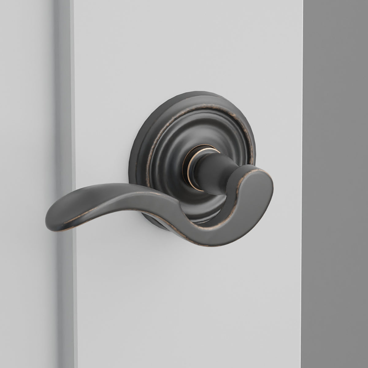 Cortina Lever Interior Lockset with Regular Rosette by Emtek, Oil-Rubbed Bronze, left handed
