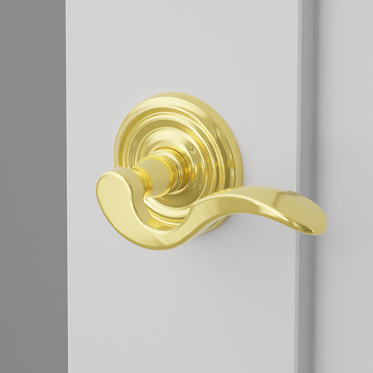 Cortina Lever Interior Lockset with Regular Rosette by Emtek, Unlacquered Brass, right handed