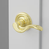 Cortina Lever Interior Lockset with Regular Rosette by Emtek, Polished Brass, right handed