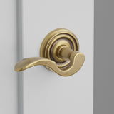 Cortina Lever Interior Lockset with Regular Rosette by Emtek, Antique Brass, left handed