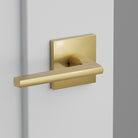Helios Lever Interior Lockset with Square Rosette by Emtek, Antique Brass, left handed