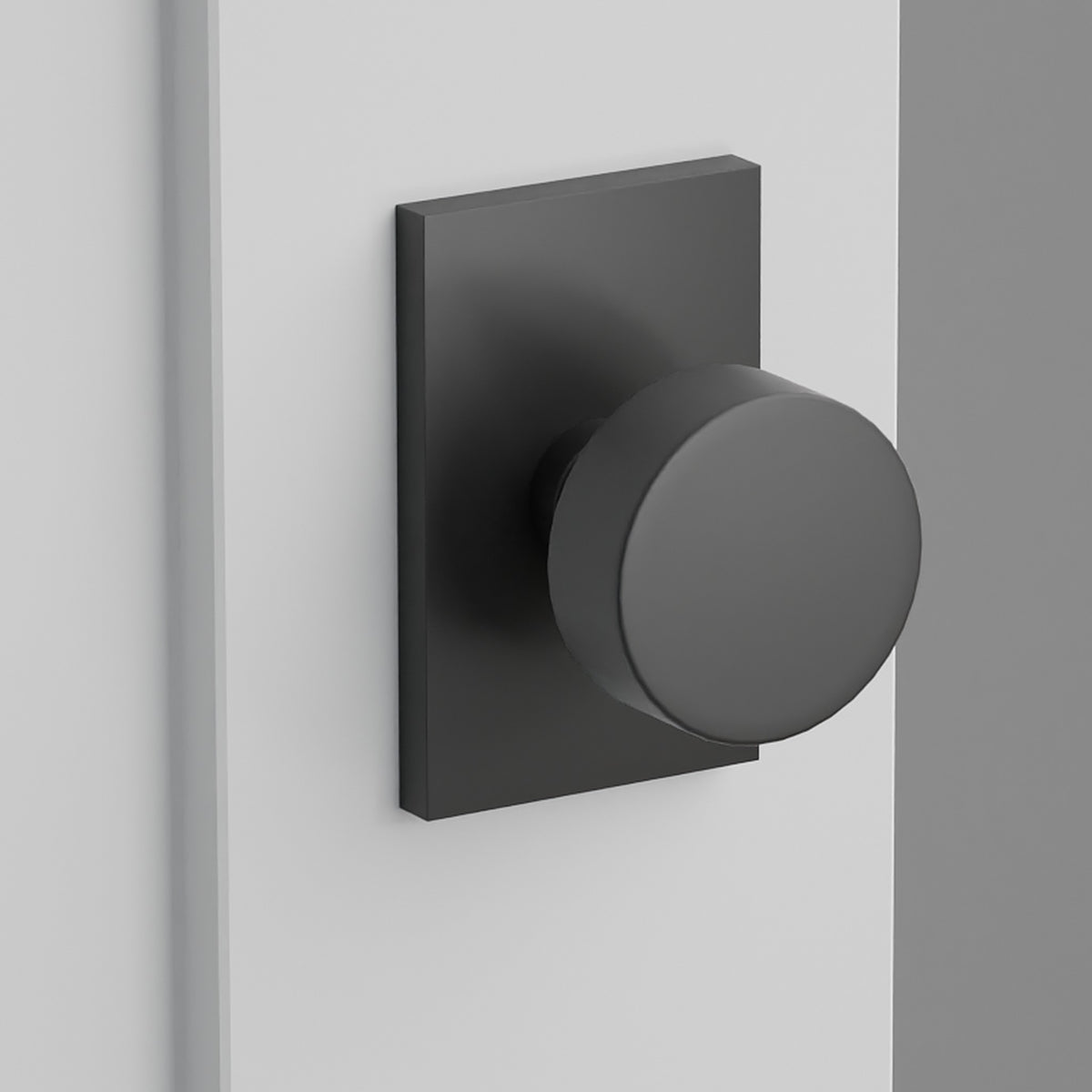 Round Knob Interior Lockset with Modern Rectangular Rosette by Emtek, Flat Black
