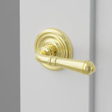 Turino Lever Interior Lockset with Regular Rosette by Emtek, Polished Brass, right handed