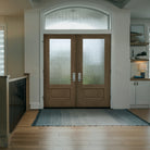 3/4 lite flush glazed fiberglass entry door with Rain glass, shown installed