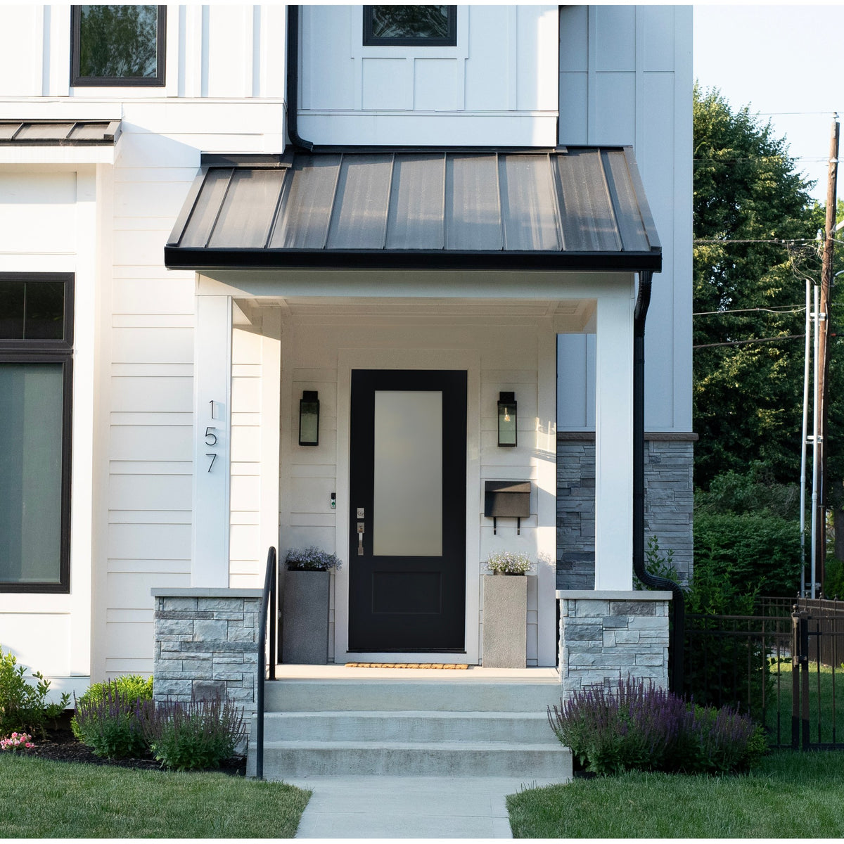 3/4 lite Shaker flush glazed fiberglass entry door with frosted glass, shown installed