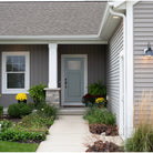 Craftsman Plank flush glazed fiberglass entry door with Micro-Granite glass, shown installed