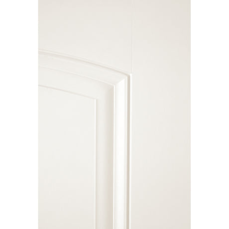 Close-up of the arched cambertop panel on a white Satin Smooth fiberglass door