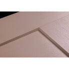 Close-up of the Shaker panel embossment on a stained Rift Cut woodgrain fiberglass door