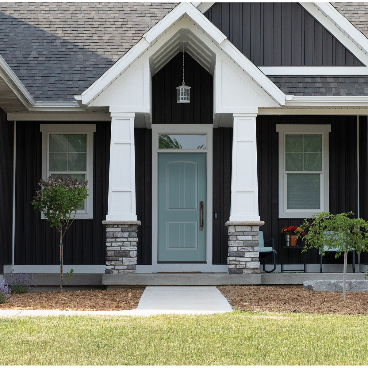 2 Panel Cambertop Plank fiberglass entry door, shown installed
