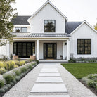 Full lite flush glazed fiberglass entry door with grilles between the glass, shown installed