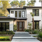 Hurricane-rated full lite flush glazed fiberglass entry door with Rain glass, shown installed