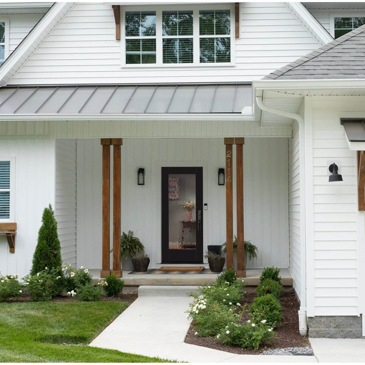 Full lite flush glazed fiberglass entry door with Vapor glass, shown installed