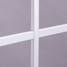 Close-up of white grilles between the glass