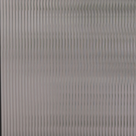 Wide Reed glass in front of a room, showing how much of the view it hides