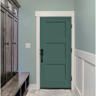 Teal 3 panel Shaker fiberglass door in a mudroom with a built-in bench