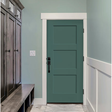 Teal 3 panel Shaker fiberglass door in a mudroom with a built-in bench