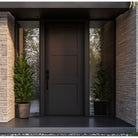 Black 8 foot 3 panel Shaker fiberglass door in a stone-clad modern entry